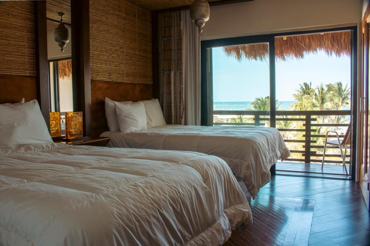 Aldea Thai Beachfront Condos Плая дел Кармен Екстериор снимка