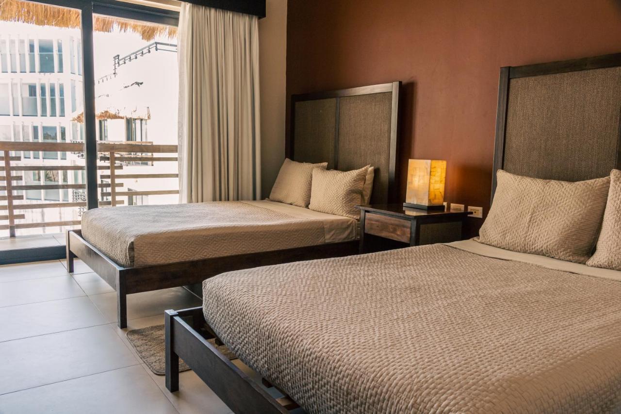 Aldea Thai Beachfront Condos Плая дел Кармен Екстериор снимка